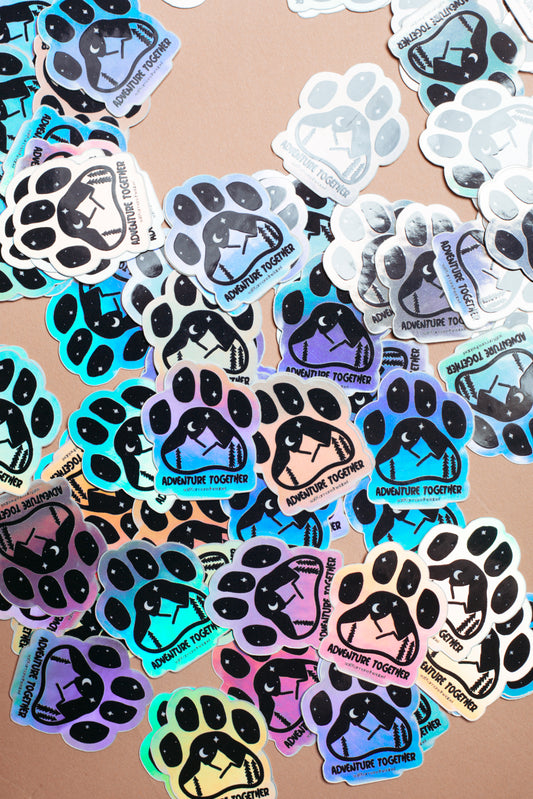 Sticker "Adventure Together" mit Holoeffekt.